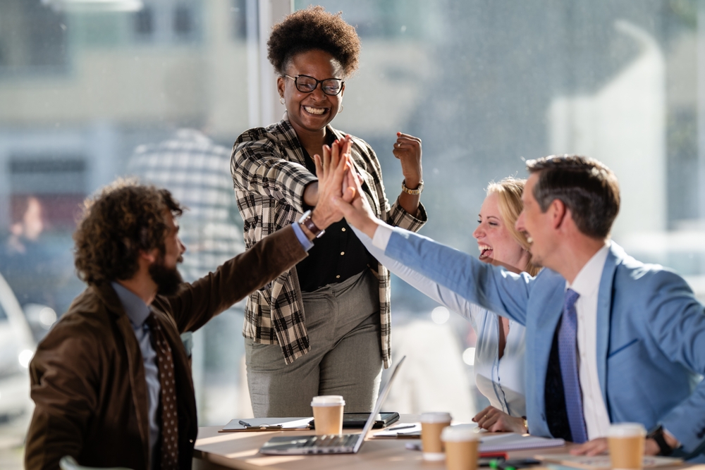 Business,Colleagues,In,An,Office,Meeting,Celebrating,Teamwork,And,Project